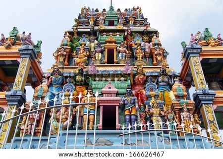 Gopuram with statues of hindu gods in Negombo, Sri Lanka  Royalty-Free Stock Photo #166626467