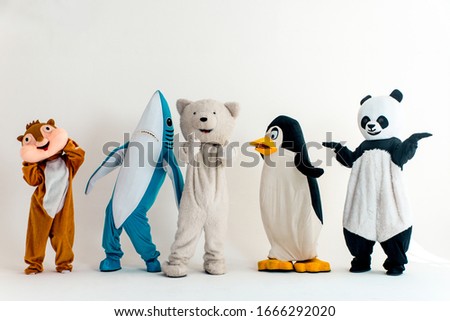 Group of mascots doing party. Concept about carnival, animals rights and lifestyle Royalty-Free Stock Photo #1666292020
