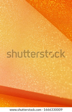 Orange glitter glow abstract. Glittering shimmer bright luxury. White and silver glow for texture wallpaper and background backdrop.
