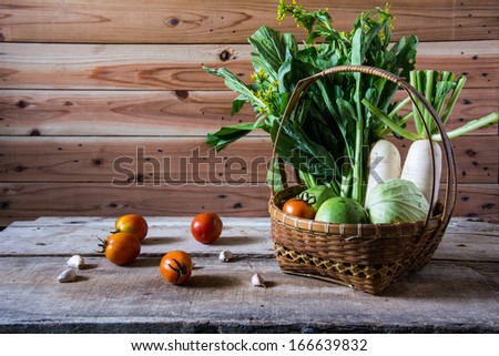 Vegetables . Fresh Bio Vegetable in a Basket. Over Nature Background 