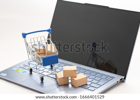 A cart and corrugated boxes with Internet shopping 