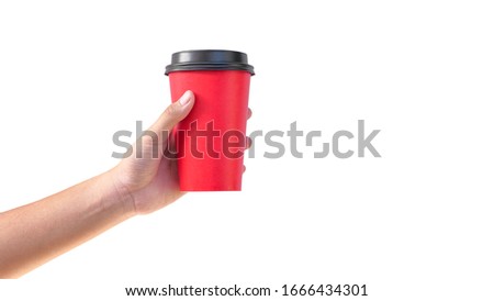 hand holding coffee paper red cup isolated on white background with clipping path.