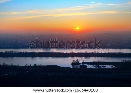 scenery with danube and vienna city in the twilight