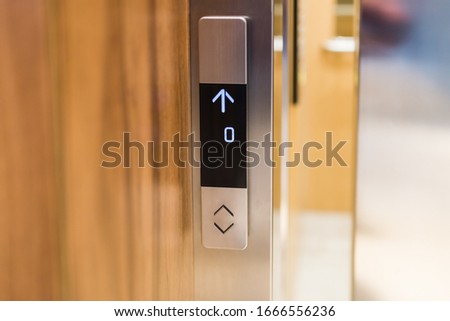 Elevator up and down buttons modern keypad.