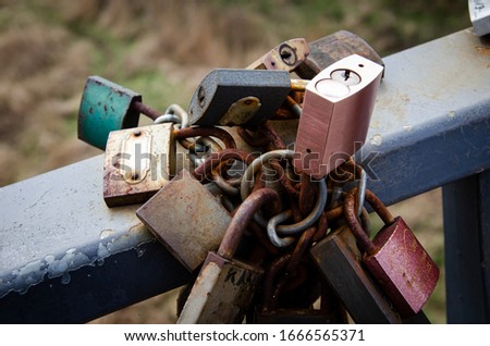 
padlocks of lovers pinned to the bridge