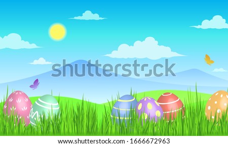Easter egg on sunny meadow background . beautiful scenery
