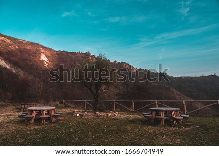 
The view from an elevated position, a picnic stop, a path surrounded by nature