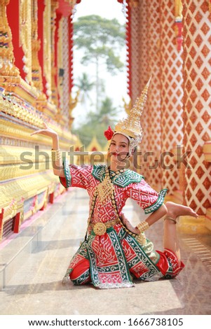 Portrait of Thai young lady in an ancient Khon Thailand  dance