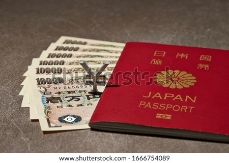 Japanese passport and currency symbol