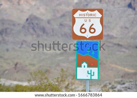 U.S. Route 66 Sign in remote Mohave County, Arizona USA Royalty-Free Stock Photo #1666783864