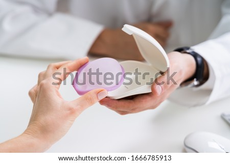 Gynecologist Consulting Woman On Diaphragm Contraception And Birth Control Method Royalty-Free Stock Photo #1666785913