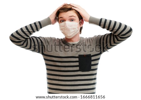 Photo isolate Caucasian guy in medical mask in panic