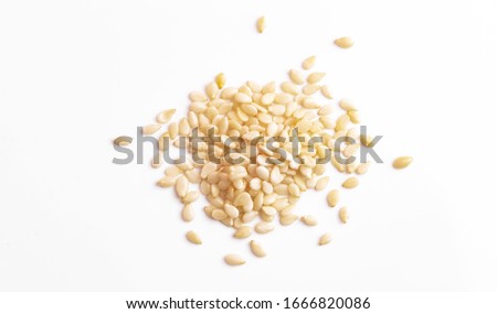 sesame seeds isolated on white background top view, macro Royalty-Free Stock Photo #1666820086