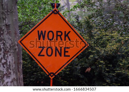 Rhombus orange work zone sign.