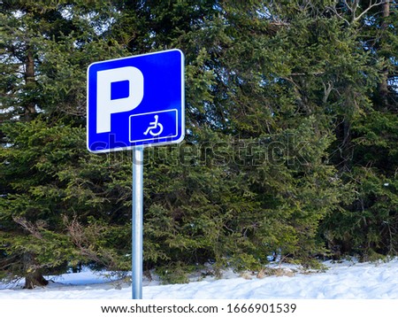 Wheelchair disabled parking sign for handicapped persons