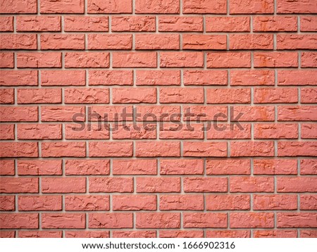 Wall of curly relief decorative red brick texture background seamless