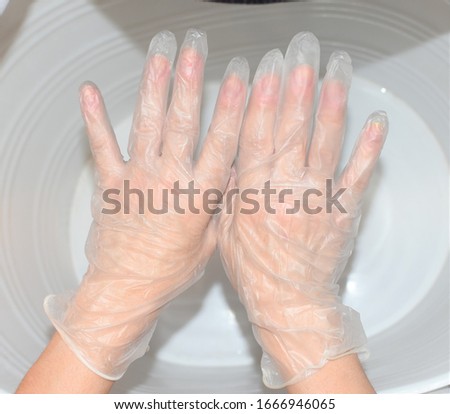 close up women  wearing medical gloves 