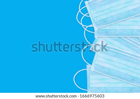 Ear-loop face mask 3 ply, Safety masks. dust protection respirator and breathing medical respiratory mask. Royalty-Free Stock Photo #1666975603