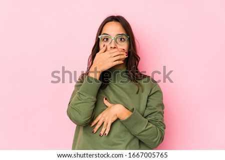 Young mixed race hispanic woman isolated scared and afraid.
