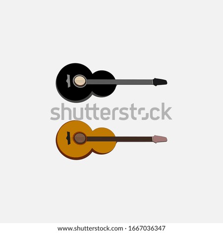 Two acoustic guitars of black and brown colors, on a white background
