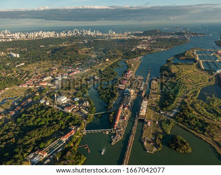 Beautiful aerial view of the Panama Channel Miraflores Locks at the Sunset Royalty-Free Stock Photo #1667042077