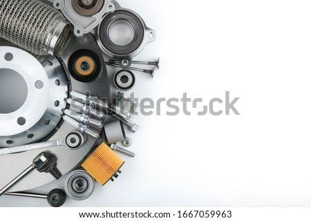 new car parts on white background with copy space view from above Royalty-Free Stock Photo #1667059963