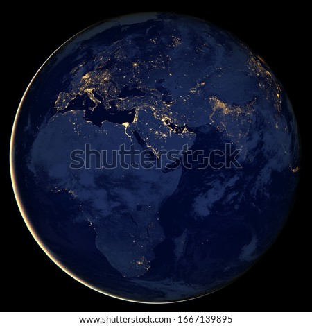 Planet Earth at night, view of city lights showing human activity in Europe, Africa and Asia from space. World map on dark globe on satellite picture, photo. Elements of this image furnished by NASA.