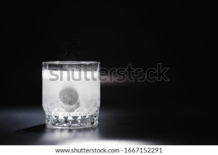 Water soluble tablets. The medicine is soluble. Anti-hangover. Effervescent tablets in glass.