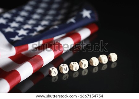 American flag on a mirror background. Symbol of the United States of America. Star-striped flag on black background.
