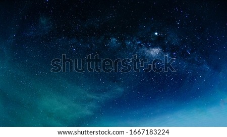 Milky way galaxy with stars and space in the universe background at thailand Royalty-Free Stock Photo #1667183224