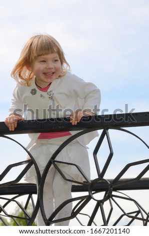 smiling little girl on a walk