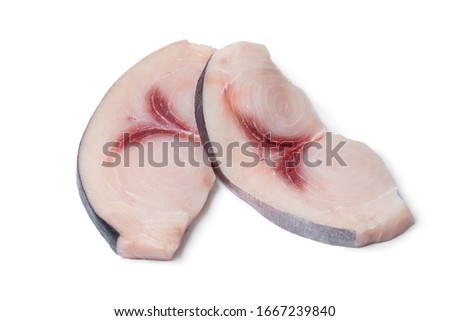 Two raw fresh swordfish fillets isolated on white background Royalty-Free Stock Photo #1667239840