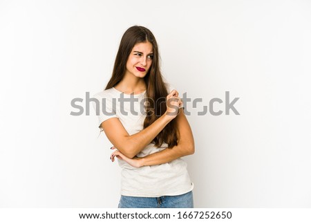 Young caucasian woman isolated on white background confused, feels doubtful and unsure.