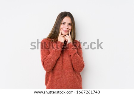 Young caucasian woman posing isolated