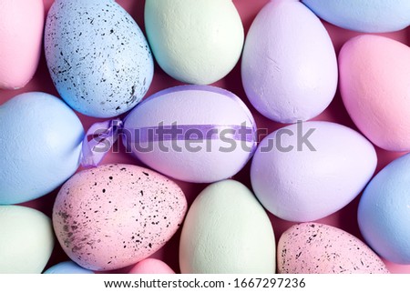 Holiday Easter pattern from handmade painted multicolored eggs as a natural festive background.