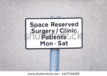 Patient surgery clinic reserved parking car space sign