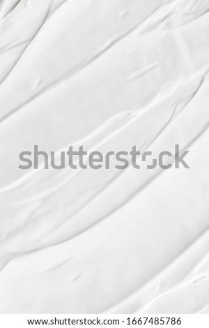 Skincare cosmetics and cream product texture or antibacterial liquid soap for hand washing for virus protection and hygiene, top view Royalty-Free Stock Photo #1667485786
