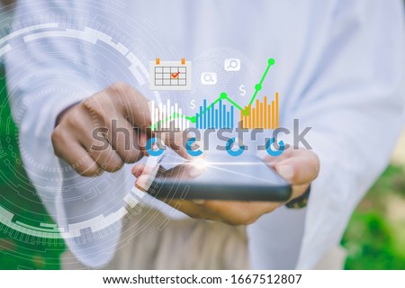 Fintech financial icon and market stock graph pop up from smartphone. Financial business technology freedom dream life concept.