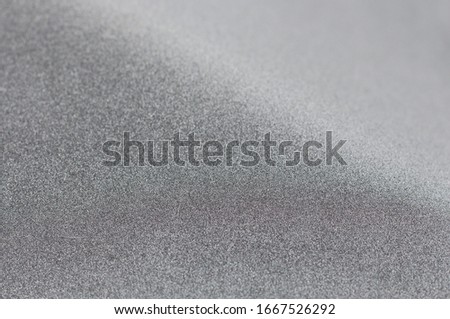 White and grey glitter glow abstract. Glittering shimmer bright luxury. White and silver glow for texture wallpaper and background backdrop.
