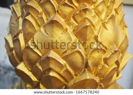 Close up of beautiful golden lotus flower petal stucco pattern and texture. Lotus Art design background in Thai temple.