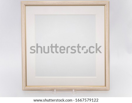 white wooden picture frame with no image
