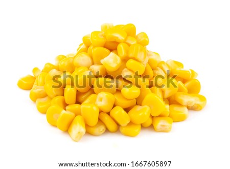 Heap of canned yellow sweet corn seeds isolated on white background Royalty-Free Stock Photo #1667605897