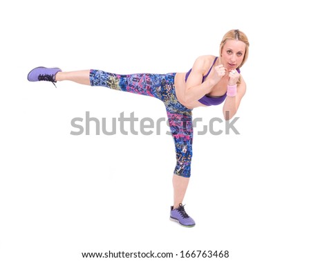 Sport young woman doing fitness exercise. Isolated on a white background. Studio shot