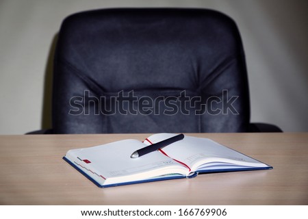 Empty workplace in office on gray background Royalty-Free Stock Photo #166769906