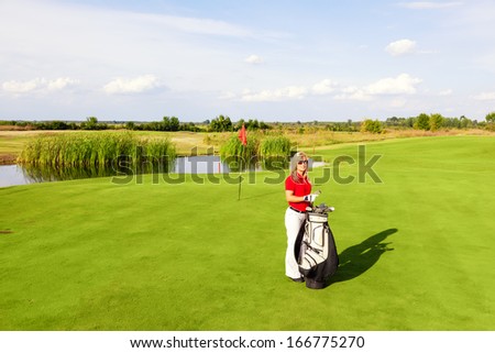 Portrait of a female golfer.Copy space