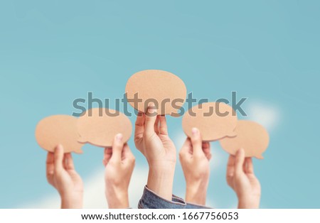 Many people showing a Blank Speech Bubble, process of discussion and commenting, Best thought, good idea, positive feedback. Opinion of the public and surrounding people Royalty-Free Stock Photo #1667756053