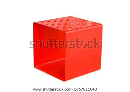 Metal red cube on a white background. Red cubes for sitting on an isolated background Royalty-Free Stock Photo #1667811043