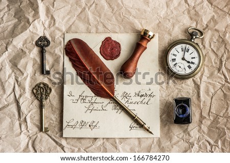nostalgic background with old letter and vintage ink pen. retro style dark toned picture