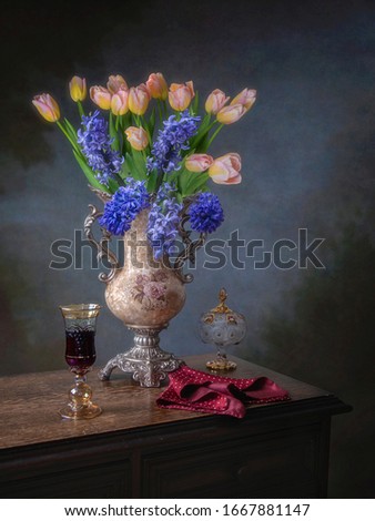 Still life with splendid bouquet of pink tulips