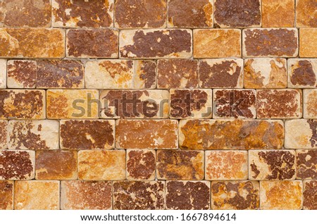 Background image of a colored stone wall